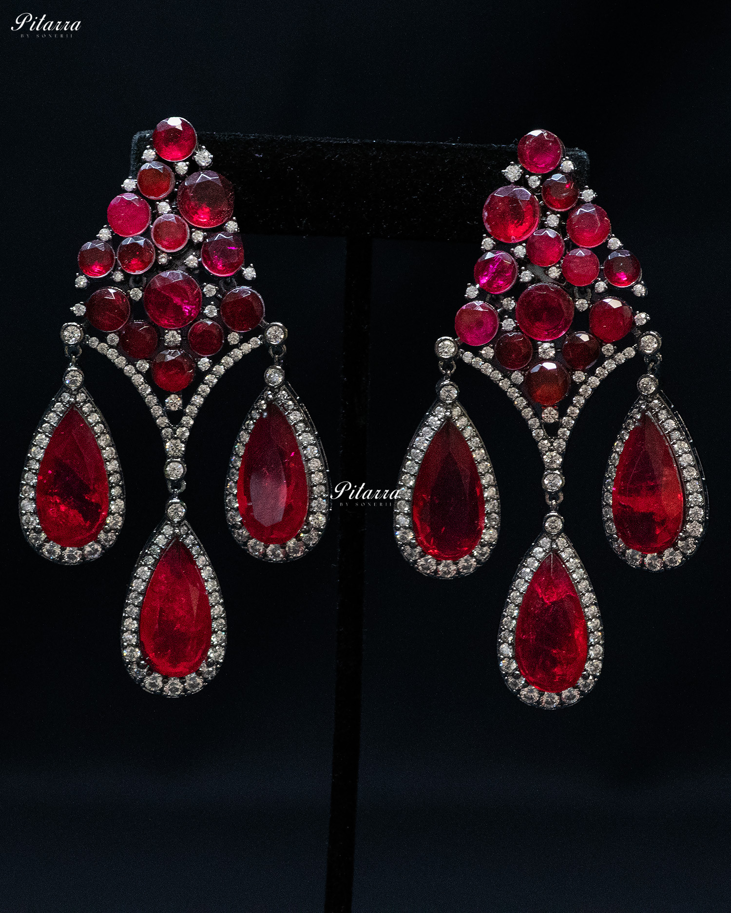 Red Stone Three Teardrop Golden Finish CZ Crystal Dangler Earrings