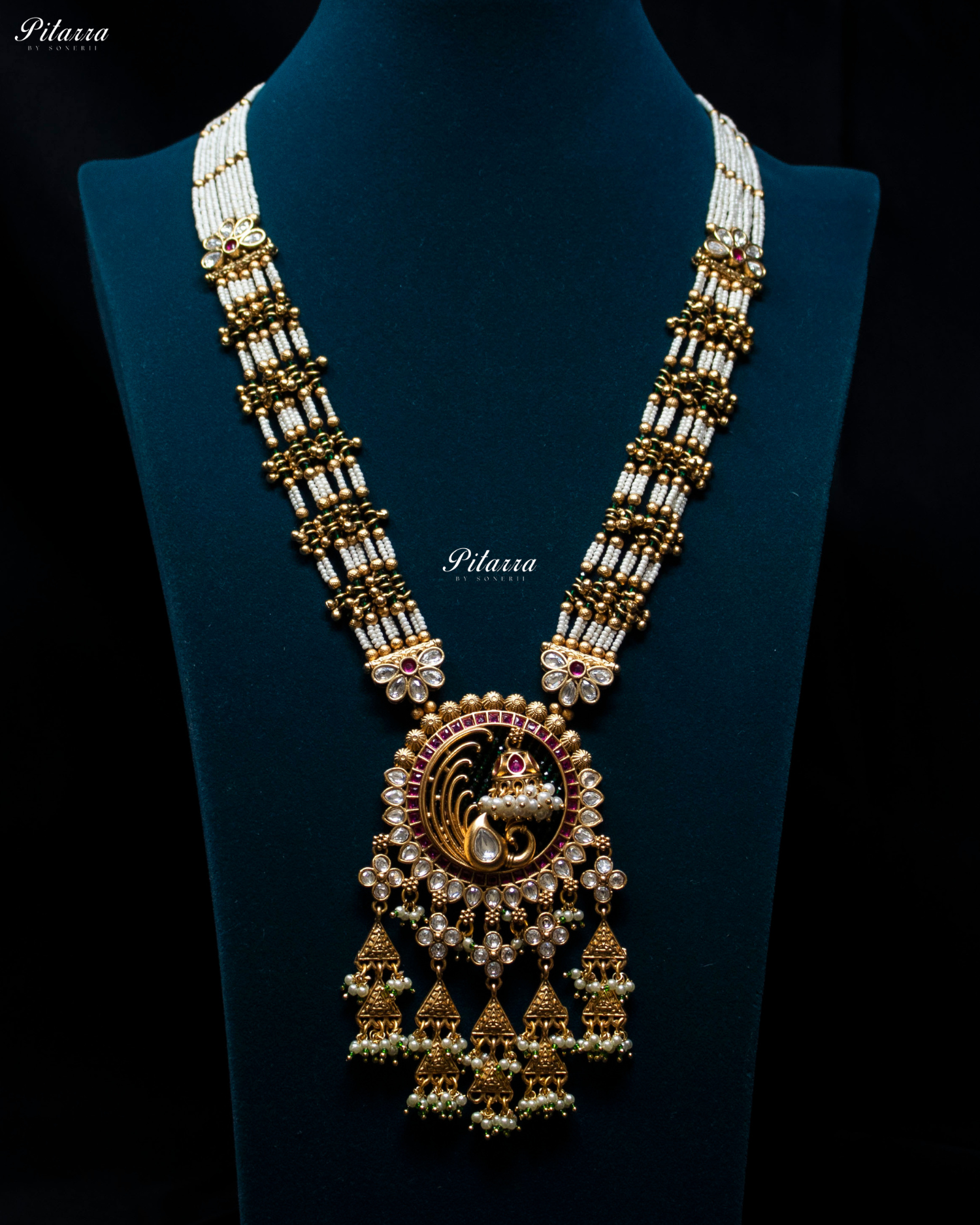Pink Tone Emerald Detailing Golden Peacock Kundan Necklace Set