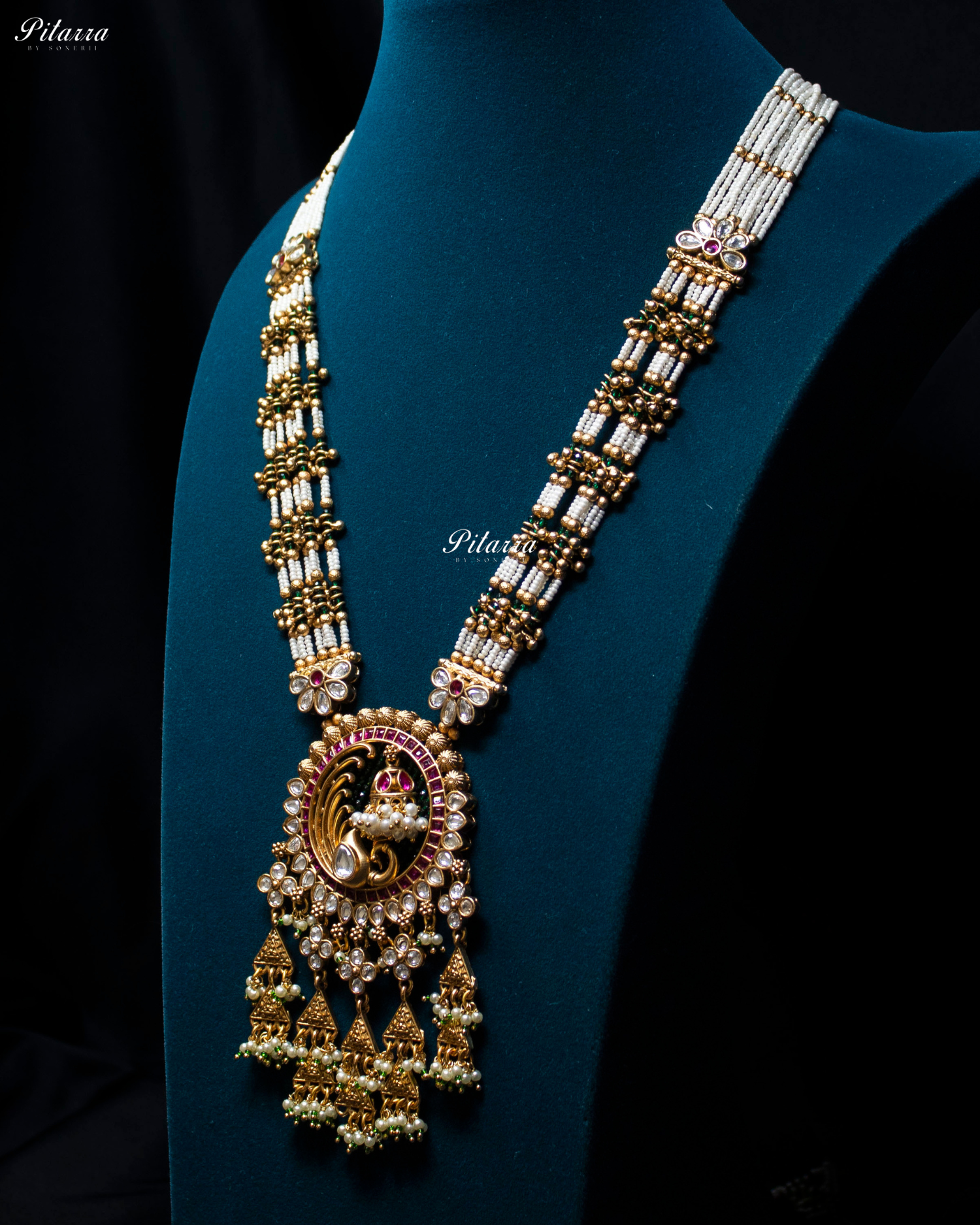 Pink Tone Emerald Detailing Golden Peacock Kundan Necklace Set