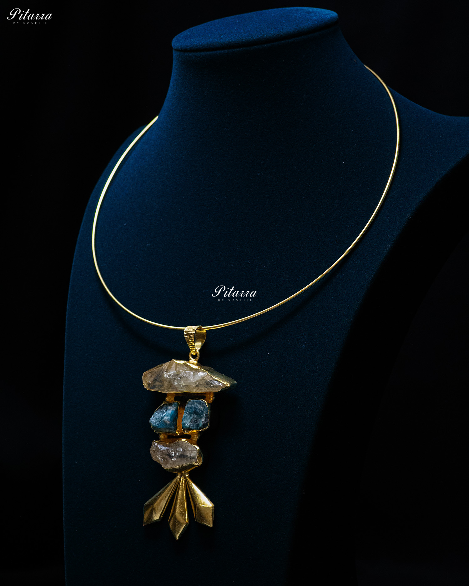 Layrerd Striking Blue Rough Stone Gold Finish Pendant