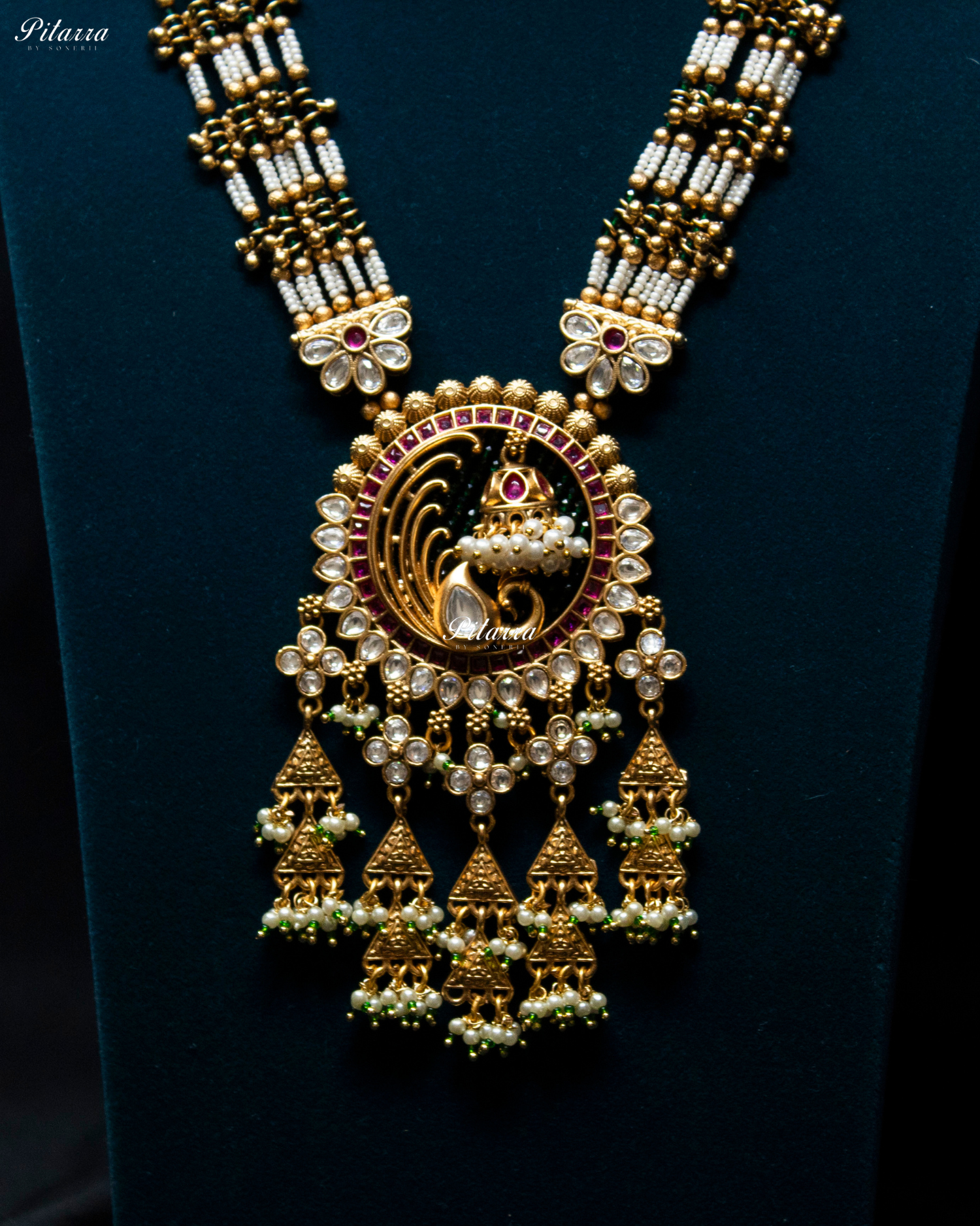 Pink Tone Emerald Detailing Golden Peacock Kundan Necklace Set