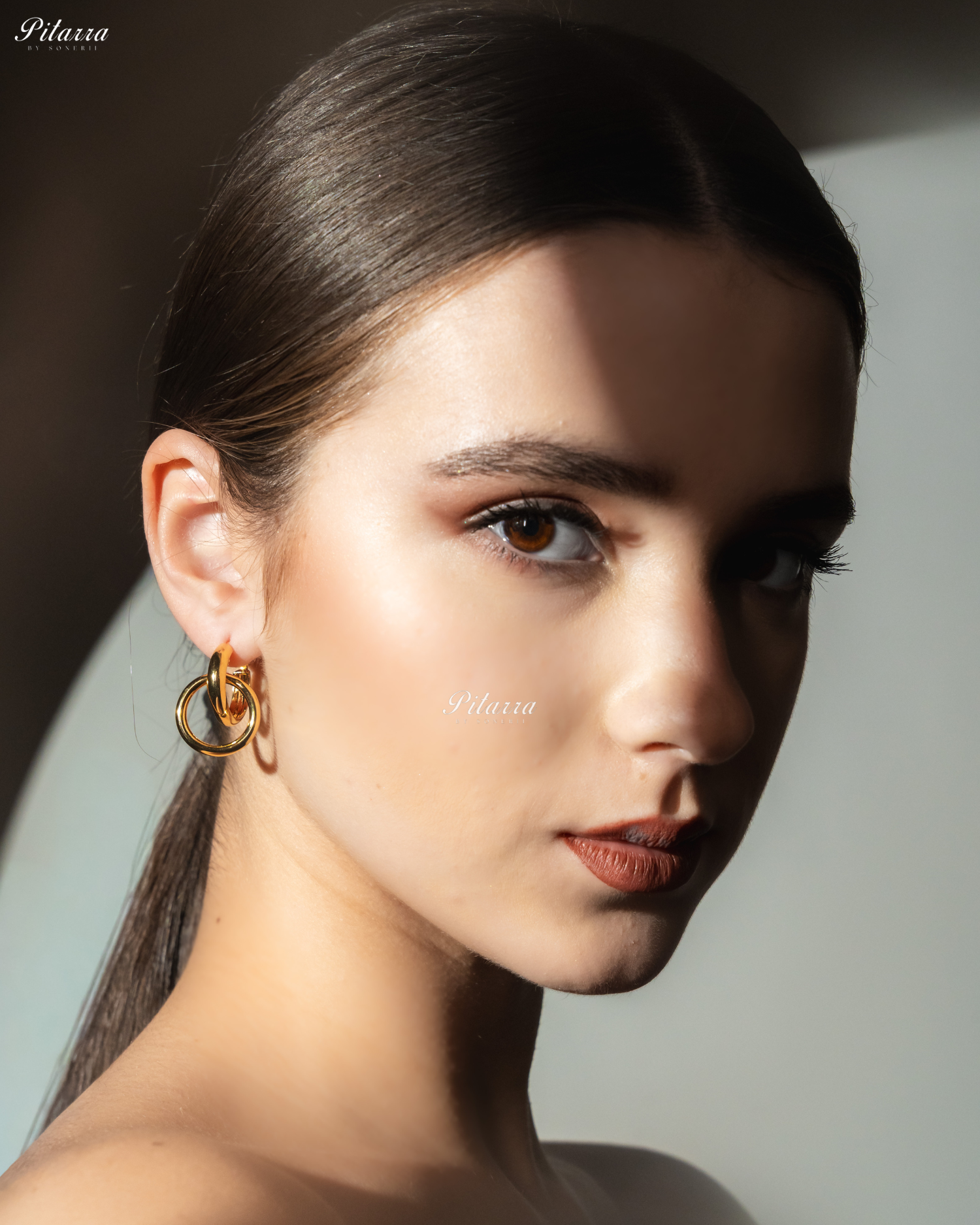 Gold Tone Interlocking Crystal Hoops Earrings