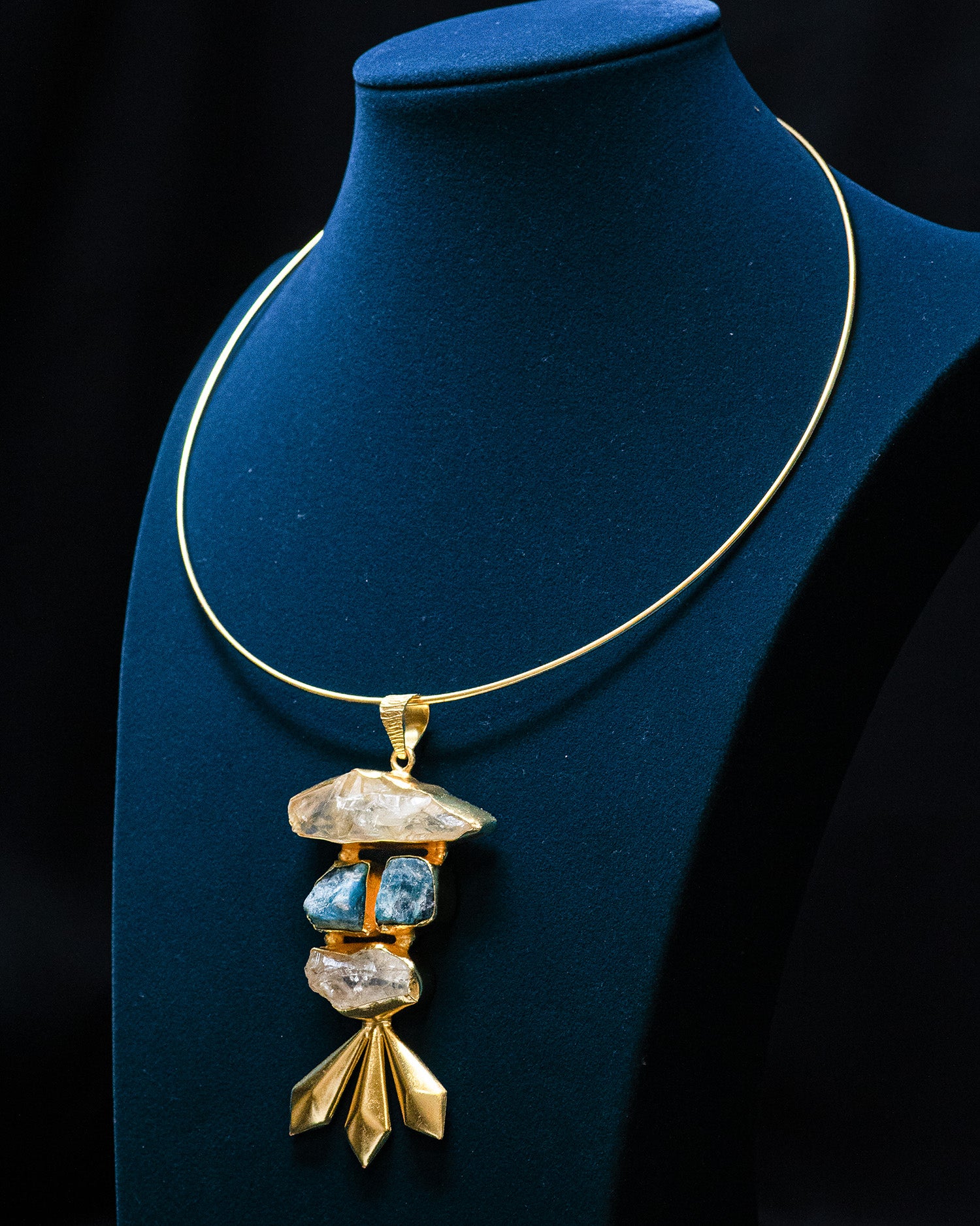Layrerd Striking Blue Rough Stone Gold Finish Pendant