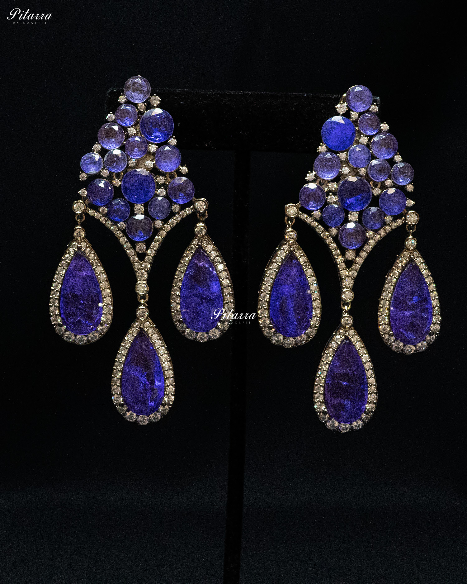 Blue Stone Three Teardrop Golden Finish CZ Crystal Dangler Earrings