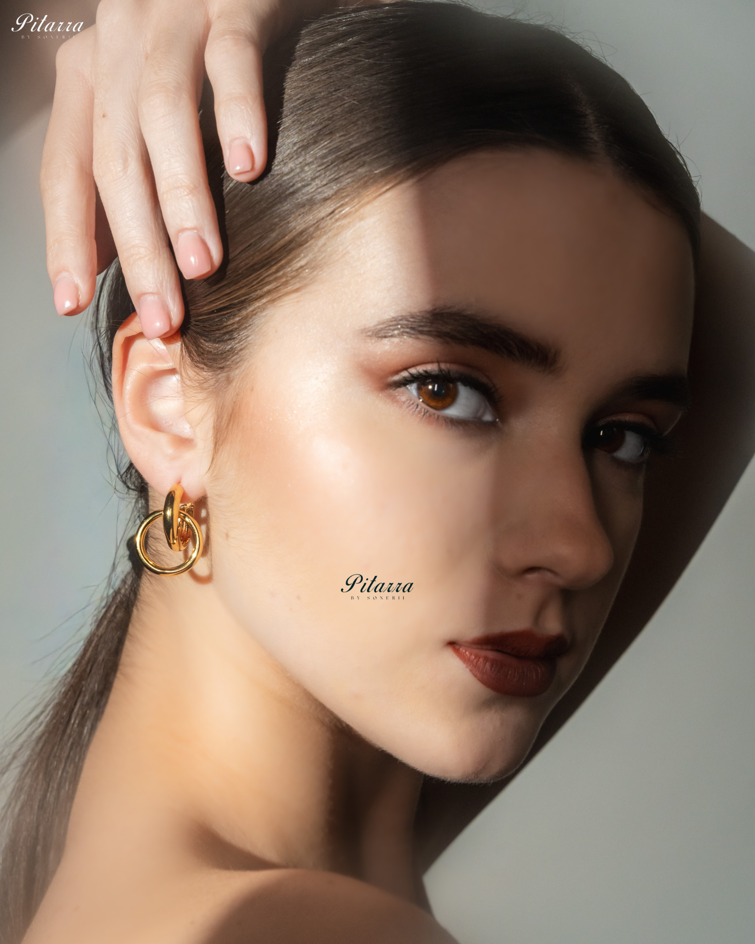 Gold Tone Interlocking Crystal Hoops Earrings
