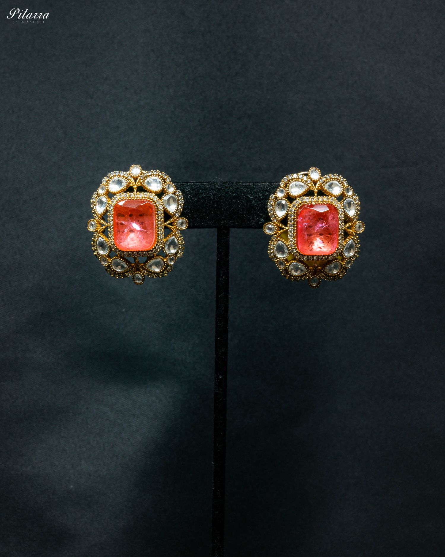 Gold Finish Orange Stone Kundan Stud Earrings_Front Image